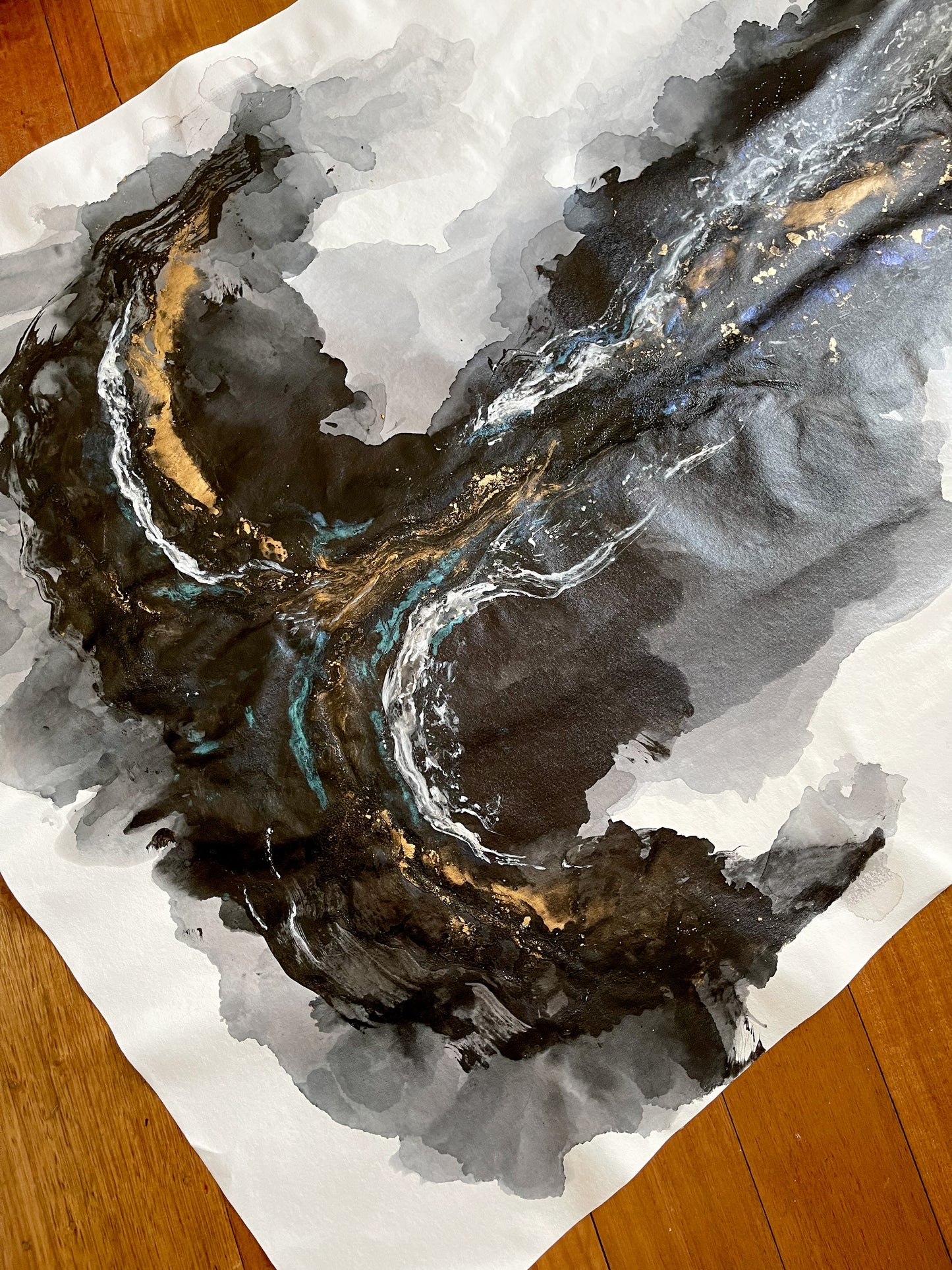 Transcendence, mixed media artwork comprising of flowing greys, blacks and blues.